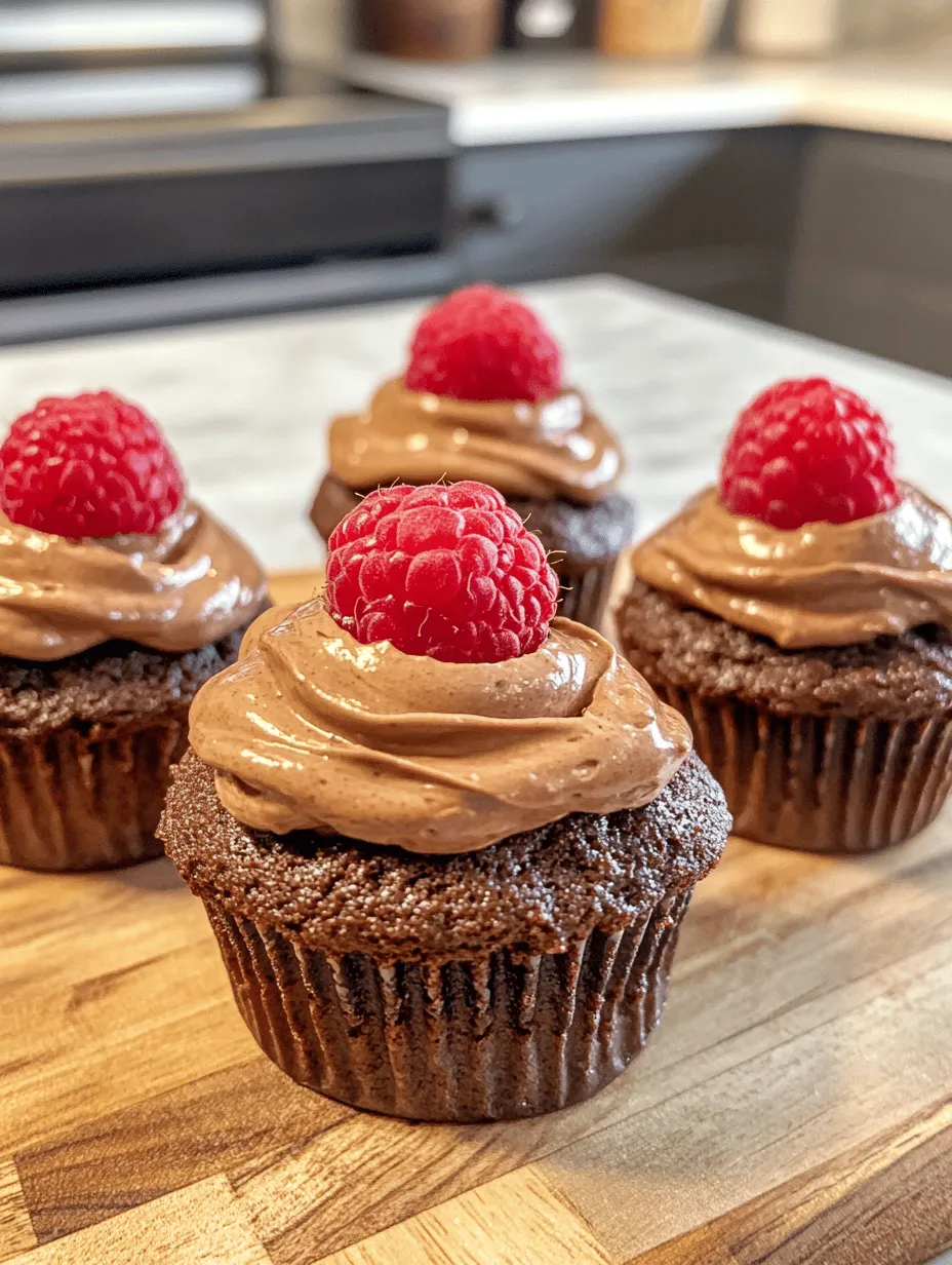 Cupcakes have taken the dessert world by storm, offering a delightful blend of flavor, texture, and presentation all in one small package. Among the myriad of flavors available, the chocolate raspberry combination stands out as a beloved choice for many dessert enthusiasts. The pairing of rich, decadent chocolate with the tartness of fresh raspberries creates a balanced profile that tantalizes the taste buds. When you add a luscious filling of Nutella, a favorite hazelnut spread known for its creamy texture and chocolatey goodness, the result is a cupcake that is not just a treat but a true indulgence.
