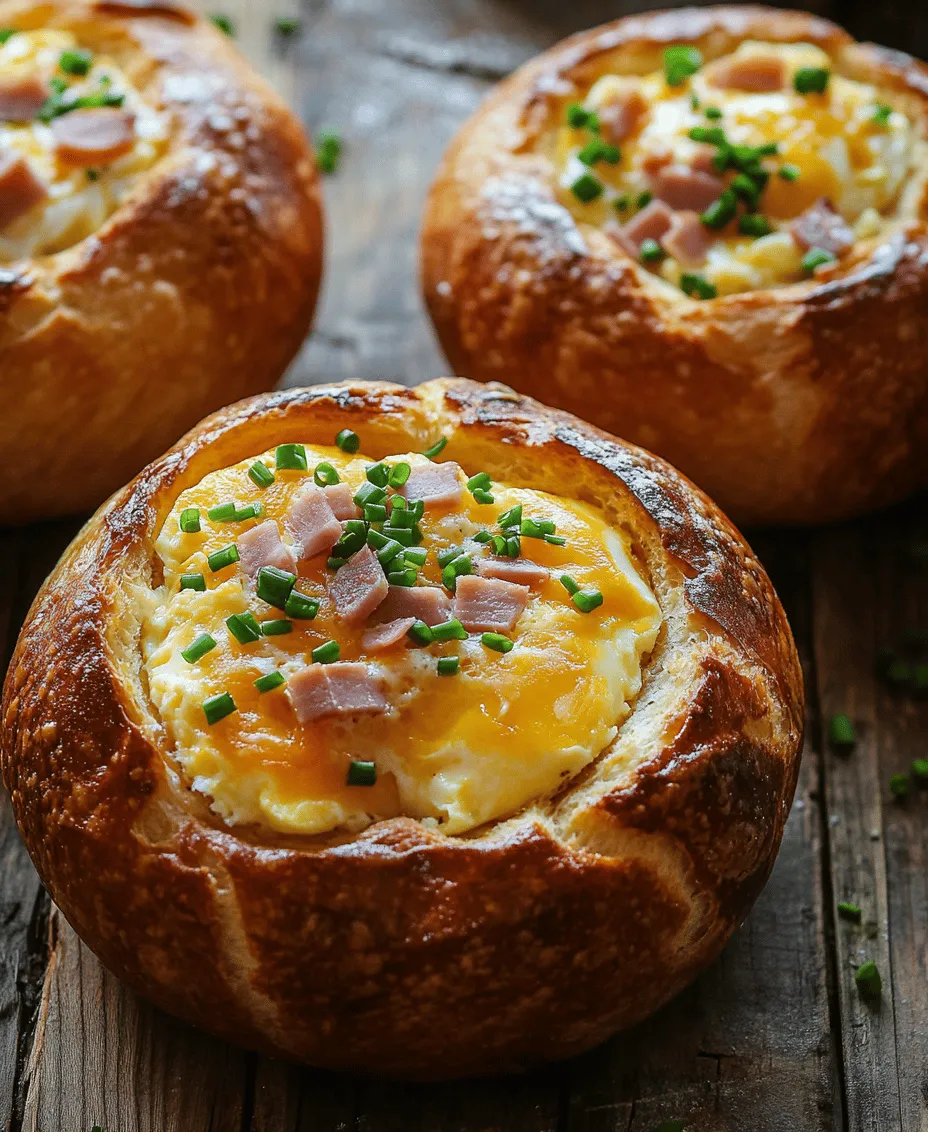 Bread bowls have gained popularity in recent years as a creative and functional way to serve a variety of fillings. Typically made from hearty bread, these bowls are hollowed out to create space for delicious fillings that can range from soups to salads, and, of course, savory mixtures like our featured ham, egg, and cheese combination. The trend of using bread as an edible vessel not only adds a unique presentation to your meal but also contributes to the overall flavor experience. As the filling warms the bread, it becomes infused with the rich flavors of the ingredients inside, making every bite a delight.