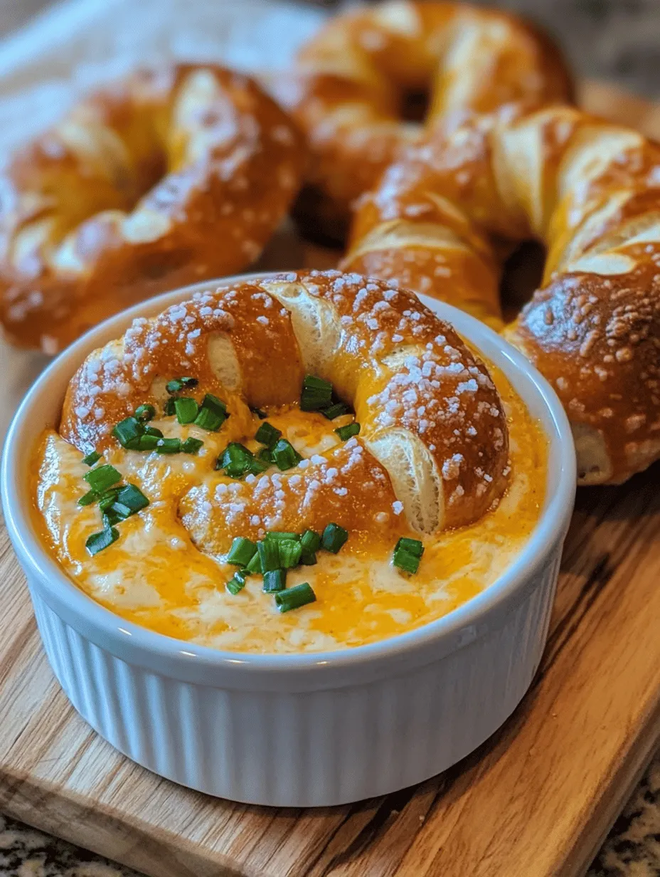 Homemade soft pretzels are a beloved snack that evokes the warmth of street fairs and cozy gatherings. Their golden-brown exterior and soft, chewy interior make them a favorite for both children and adults alike. Pairing these delightful pretzels with a rich and creamy cheese dip elevates the experience, creating a perfect balance of flavors that is hard to resist. Whether enjoyed as an appetizer, a game-day snack, or a comforting treat at home, cheesy soft pretzels are sure to please.