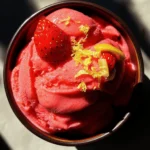 As the warmth of summer approaches, nothing is more refreshing than a scoop of sorbet. This delightful frozen treat not only cools you down but also tantalizes your taste buds with vibrant flavors. Sorbet is the perfect dessert option for those seeking a lighter alternative to ice cream, especially during hot weather when a refreshing dessert is a must. One such enticing option is Strawberry Lemon Sorbet, a harmonious blend of sweet strawberries and zesty lemons that can elevate any gathering, from backyard barbecues to elegant dinner parties.