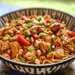 Kung Pao Chicken Noodles is a delightful fusion dish that combines the bold flavors of traditional Kung Pao Chicken with the comforting texture of noodles. Originating from the Sichuan province of China, Kung Pao Chicken has long been celebrated for its unique blend of savory, spicy, and slightly sweet flavors. The addition of noodles transforms this classic recipe into a hearty meal that is perfect for any occasion, whether you're looking to whip up a quick weeknight dinner or impress guests at a gathering.